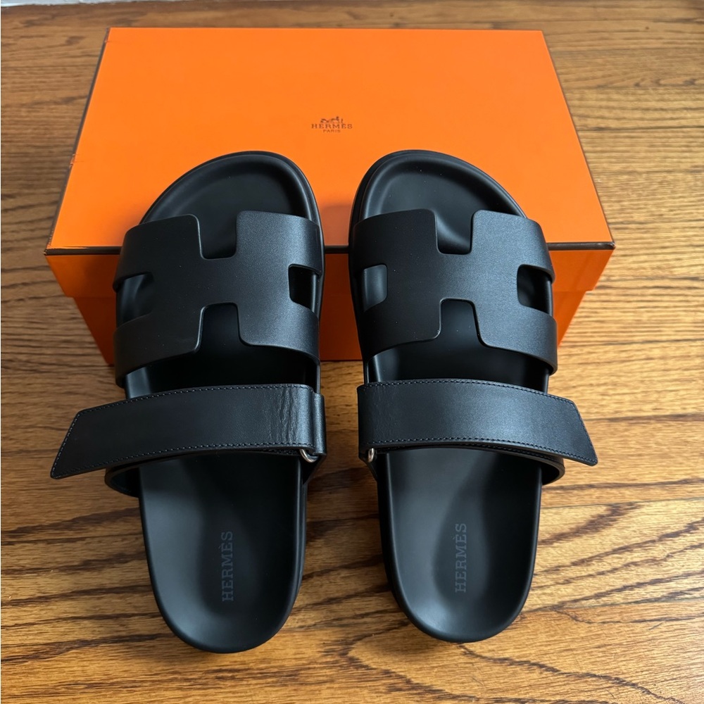 Hermes Women’s Chypre Sandals in Noir